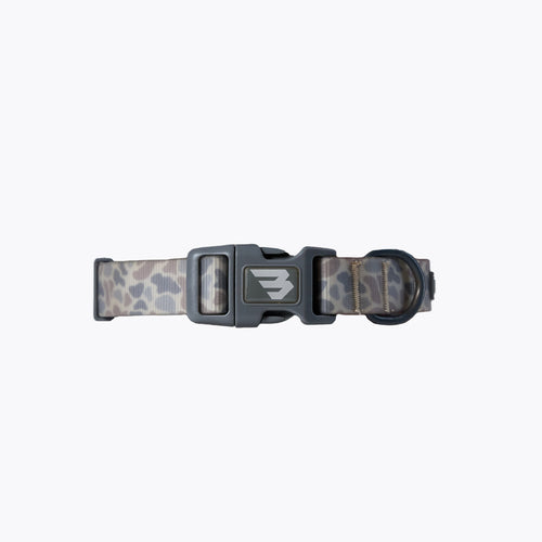 Dog collar with camouflage pattern and brand logo on a white background