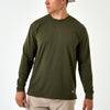 Man wearing the Mallard Green Long Sleeve Go To Tee with khaki pants, front view on a white background