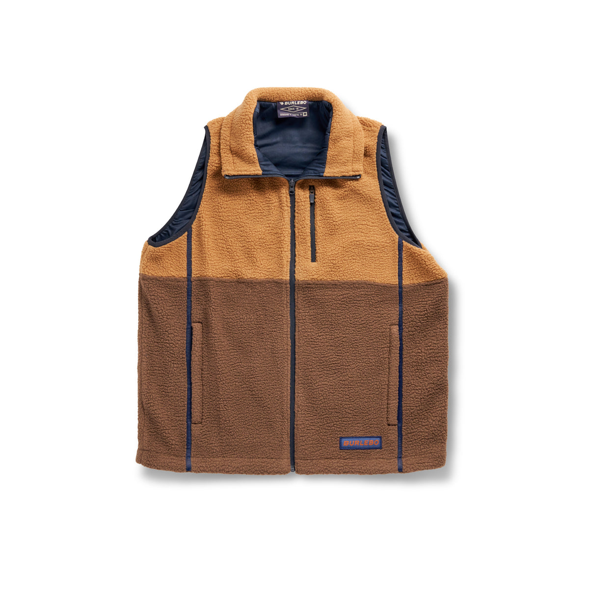 Flat lay front of the Multi Brown Montana Vest, tan top and brown bottom with navy lining and zipper trim