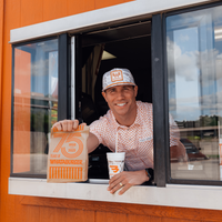 Performance Polo - WHATA Logo - Orange & White